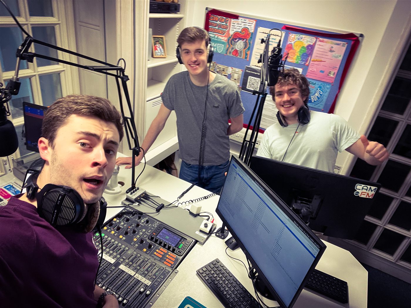 Patrick and two other CamFM presenters in the studio