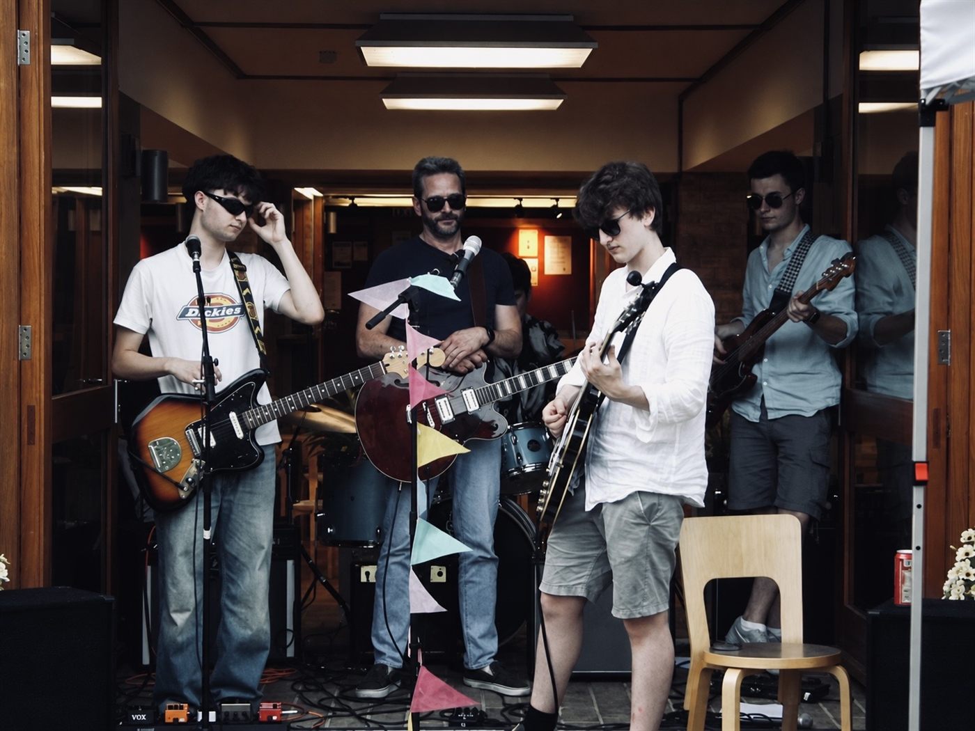 Patrick performing live outdoors with his band